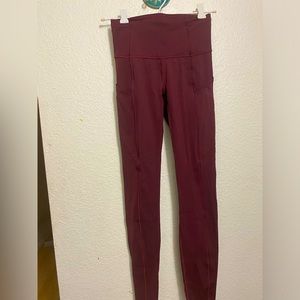 Size 2 lululemon never worn, maroon. Add with other lulu pants 2 for 34